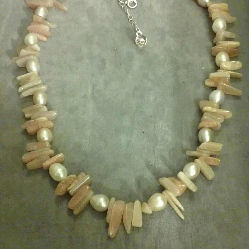 Pearl necklace and gemstones
